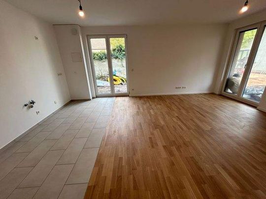 Attraktive 4-Zimmer Wohnung mit Terrasse und Garten zu vermieten! - Photo 1