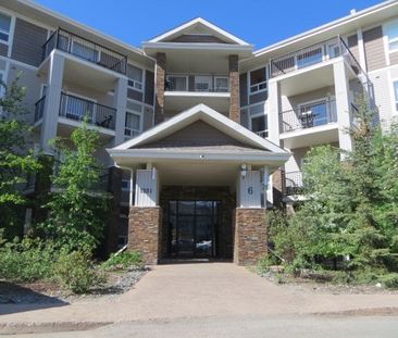 Op Floor 2 Bedroom Condo With 2 Bathrooms & 2 Parking Stalls – Loca... - Photo 6