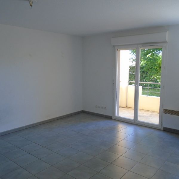 Location Appartement 2 pièces 45m² LANNEMEZAN 65300 - Photo 1