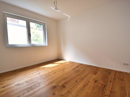 Exklusive Neubauwohnung mit Terrasse und Garten! 90qm, hochwertige Einbauküche, Parkett, Rolläden... - Foto 3