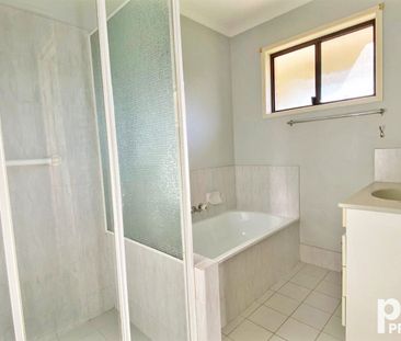 Neat as a pin - Central & Handy location! - Photo 1