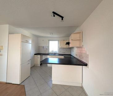 Dachgeschosswohnung – mit Kamin & offener Küche - Photo 3