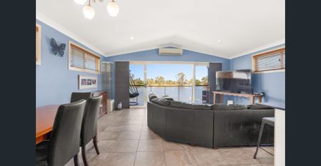Riverside Living with Lift Access & Stunning Water Views – Fully Appointed Family Home - Photo 5