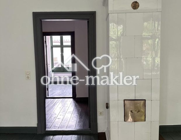 Charmante Maisonette mit Dachterrasse, Dielenboden u. Kachelofen in zentraler Stadtlage - Foto 1