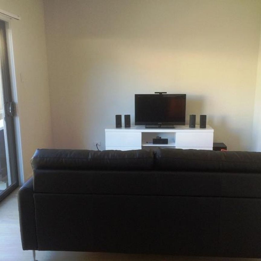 Three Bedroom Townhouse in Excellent Location - Photo 1