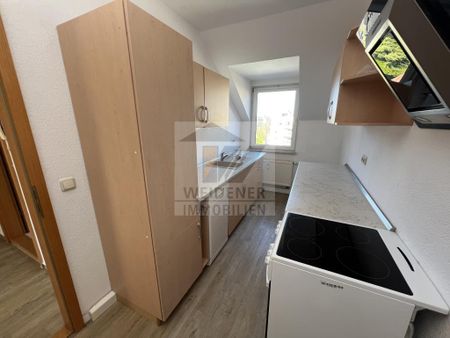 3-Zimmer-Dachgeschosswohnung mit Einbauküche und Boden – nahe der Innenstadt! - Foto 4