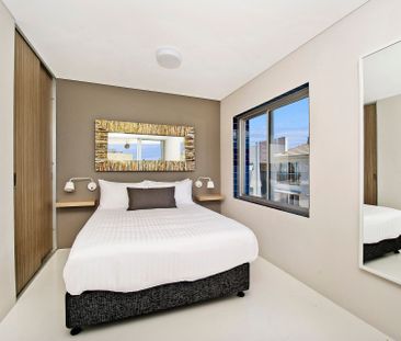 LARGE L-SHAPED, FULLY FURNISHED STUDIO APARTMENT! - Photo 2