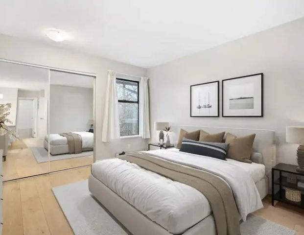 Eagle Ridge Apartments- Gated Community Living with Pool & Tennis Courts | 1180 Lansdowne Drive, Coquitlam - Photo 1