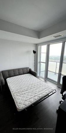 Partially Furnished 1 Bedroom Condo for Lease – Simcoe / Windfields - Photo 1