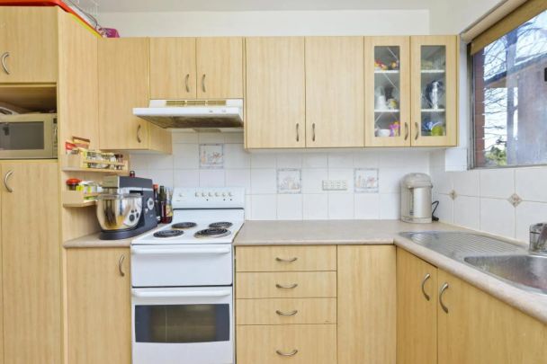 Feel at Home in This Neat Two‑Bedroom Unit - Photo 1