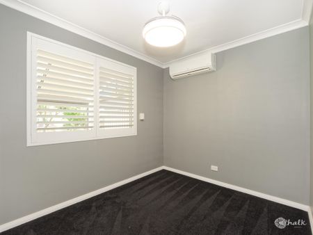 CONVENIENTLY LOCATED, COMFORTABLE 3X1 FAMILY HOME!!! - Photo 5