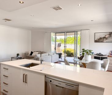 Coastal Convenience Meets City Living - Well-Maintained Home in Pri... - Photo 1