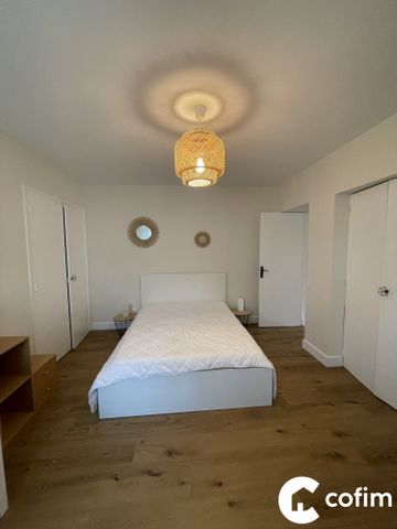 Appartement T2 meublé avec terrasse et parking - Photo 3