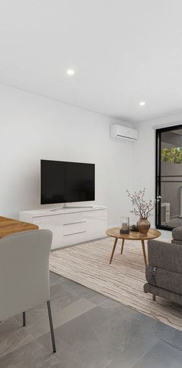 Modern two bedroom unit - 20% below market rent - Photo 1