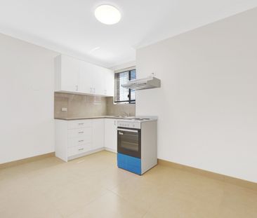 Newly renovated 2 bedroom unit in the heart of merrylands - Photo 2