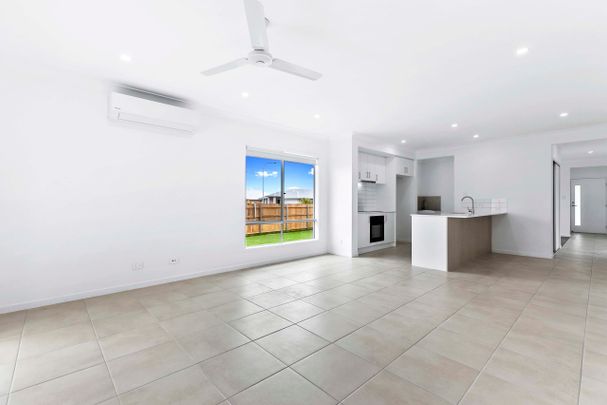 BRAND NEW HOME IN BURRUM HEADS - Photo 1