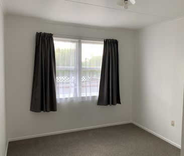 Newly refurbished and ideally located, this tidy two-bedroom unit o... - Photo 3