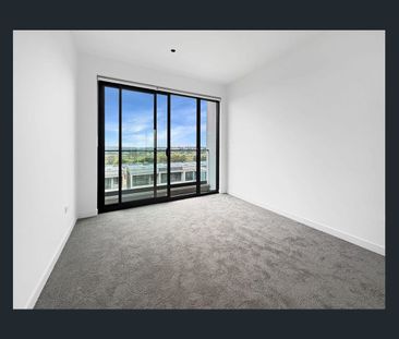 Spacious Three-Level Townhouse with Workshop & Dual Outdoor Living - Photo 3