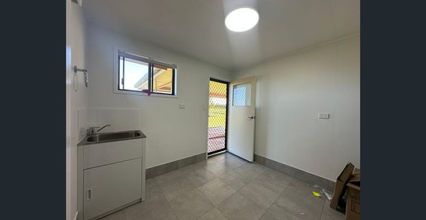 FULLY RENOVATED FOUR BEDROOM HOME WITH HEAPS OF SHED SPACE! - Photo 1