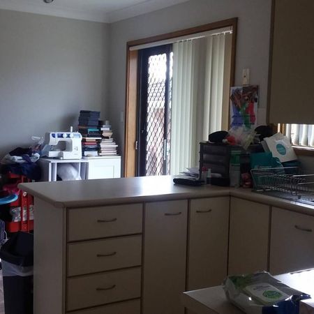 Charming 3 Bedroom Brick Home with Double Garage - Photo 3