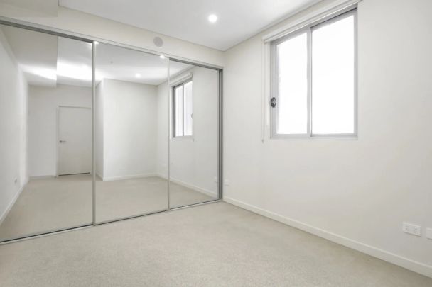 Immaculate and Convenient Two Bedroom Apartment - Photo 1
