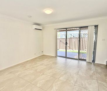 Modern Townhouse In Convenient Location - Photo 1