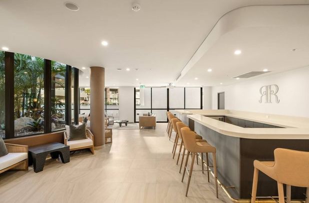 Hotel living with water views, pool, gym, sauna, spa, virtual golf and so much more! - Photo 1