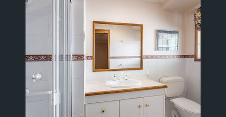 This impeccably presented lowset brick unit is sure to impress! - Photo 5