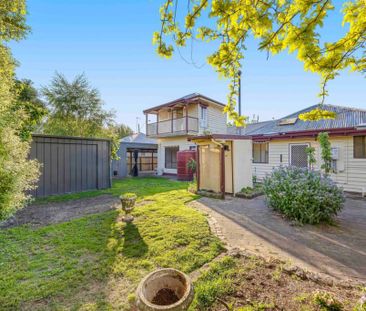 Four-Bedroom Family Home with Dual Driveways and Shedding - Photo 5