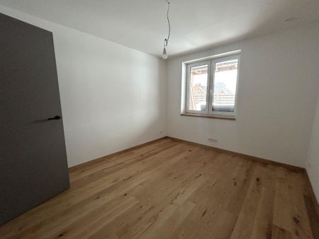 Komfortables Wohnen auf einer Ebene – schicke Erdgeschosswohnung mit einem großzügigen Garten! - Photo 4