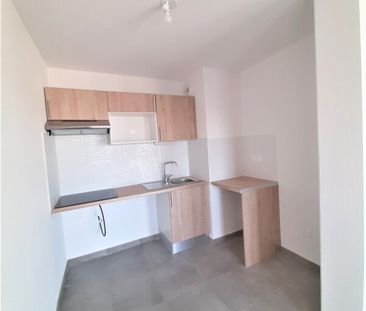 Location Appartement 3 pièces 63m² NIMES 30000 - Photo 4