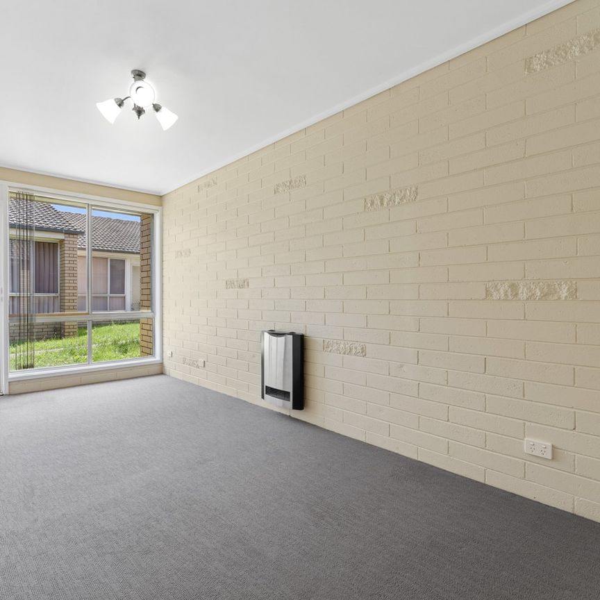 Tidy Two-Bedroom Unit in the Heart of Town - Photo 1