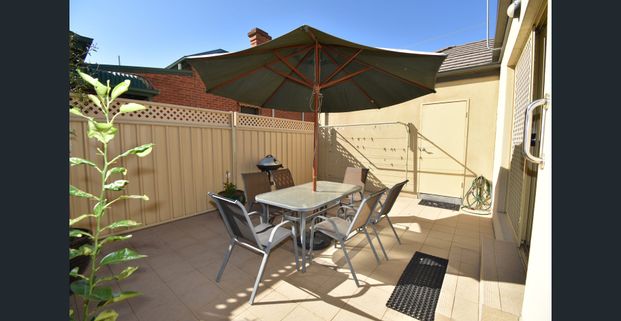 FULLY FURNISHED HOME IN THE HEART OF THE CBD - Photo 1