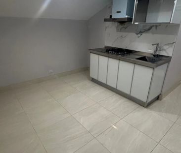 Spacious, Well-Maintained Boutique Studio Apartment in Prime Location - Photo 6