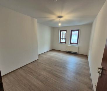 Moderne trifft Gemütlichkeit: 3-Zimmer-Wohnung im malerischen Ortsk... - Photo 1