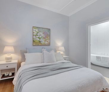 BEAUTIFULLY RENOVATED HOME FULL OF NATURAL LIGHT - Photo 2