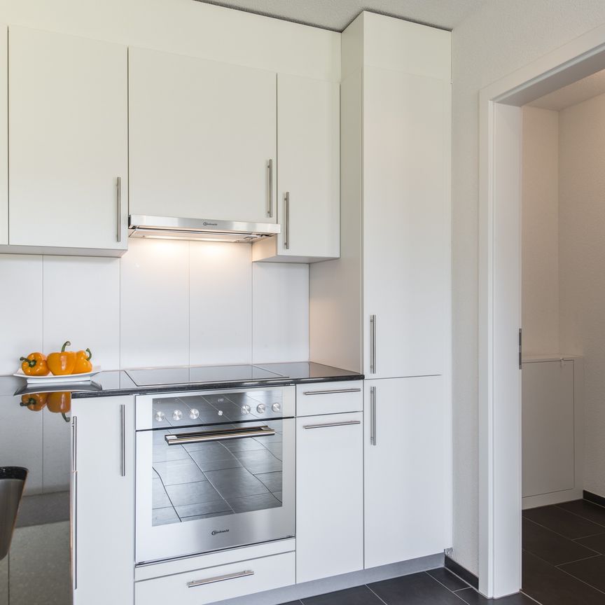 Grün trifft Behaglichkeit - Ihre Erdgeschosswohnung mit Gartensitzplatz! - Photo 1