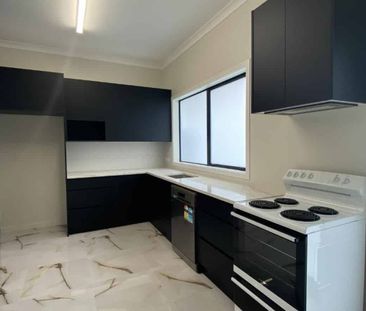 Stylish new two-bedroom - Photo 1