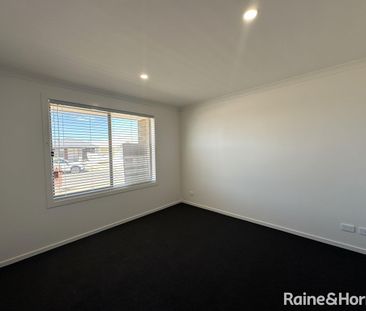 Modern Family Living in the Heart of Munno Para Downs - Photo 6