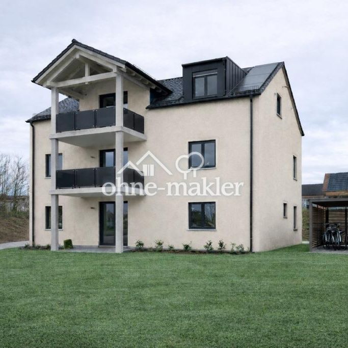 Luxuriöse Neubau 4-Zimmer Erdgeschosswohnung mit Garten in Großmehring - Photo 1