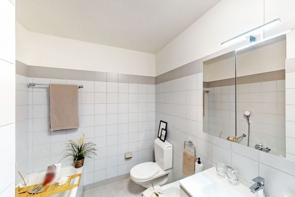 Il lusso sulle acque: Appartamento 3.5 locali con vista sul Lago di Lugano - Foto 1