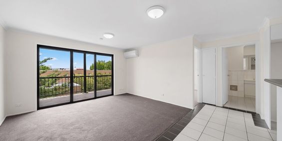 Light, Bright & Ideally Located - Photo 3