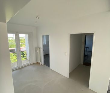 Dachgeschosswohung mit Weitblick 3-Zimmer // DG, rechts - Photo 1