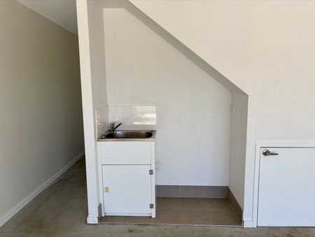 Trendy Townhouse Designed With A New York Warehouse Feel - Photo 3