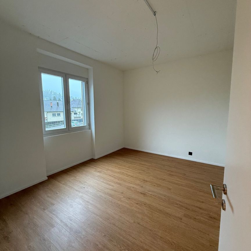 Moderne 2.5-Zimmer-Wohnung an zentraler Lage in Reinach - Photo 1