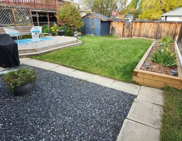 Updated Bowness Legal Suite with Yard | Calgary - Photo 1