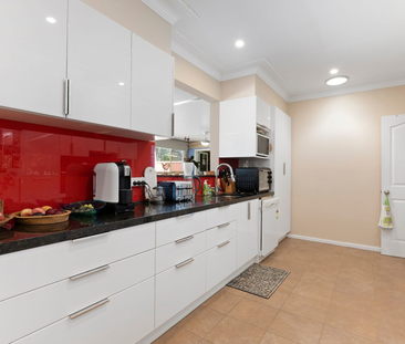 Family Home with Pool in Convenient Macquarie Hills Location - Photo 3