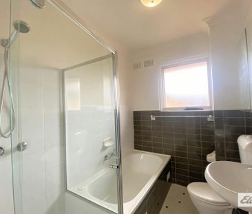 ELEVATED UNIT IN A CENTRAL LOCATION - Photo 1