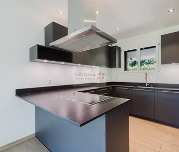 Modern villa with lake view and exceptional setting - Photo 4