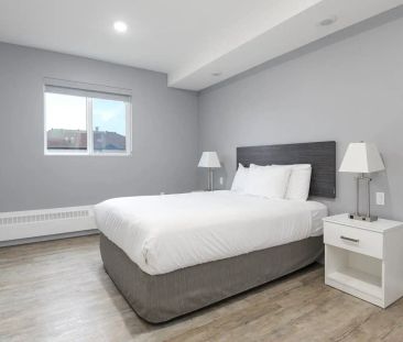 Metro 1827 — Beautiful 2 Bedroom Suite (Furnished) - Photo 3